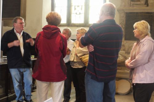 Dave Adgar shows visitors Old Holy Trinity Church, Wentworth